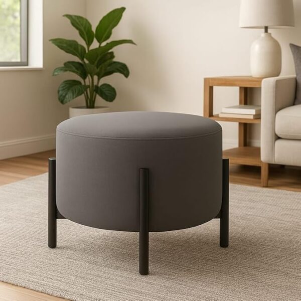 Jaico Modern Round Ottoman Footstool | Grey Upholstered Pouf with Black Metal Legs, Minimalist Accent Stool for Living Room or Bedroom